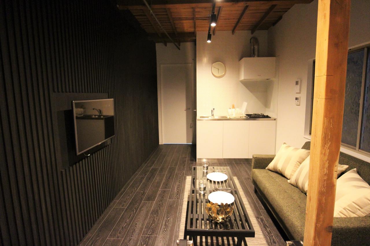 Sekai Hotel Tsuki Osaka Bagian luar foto
