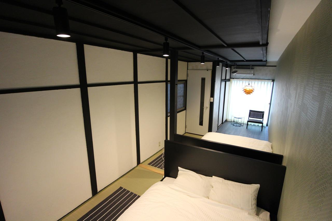 Sekai Hotel Tsuki Osaka Bagian luar foto