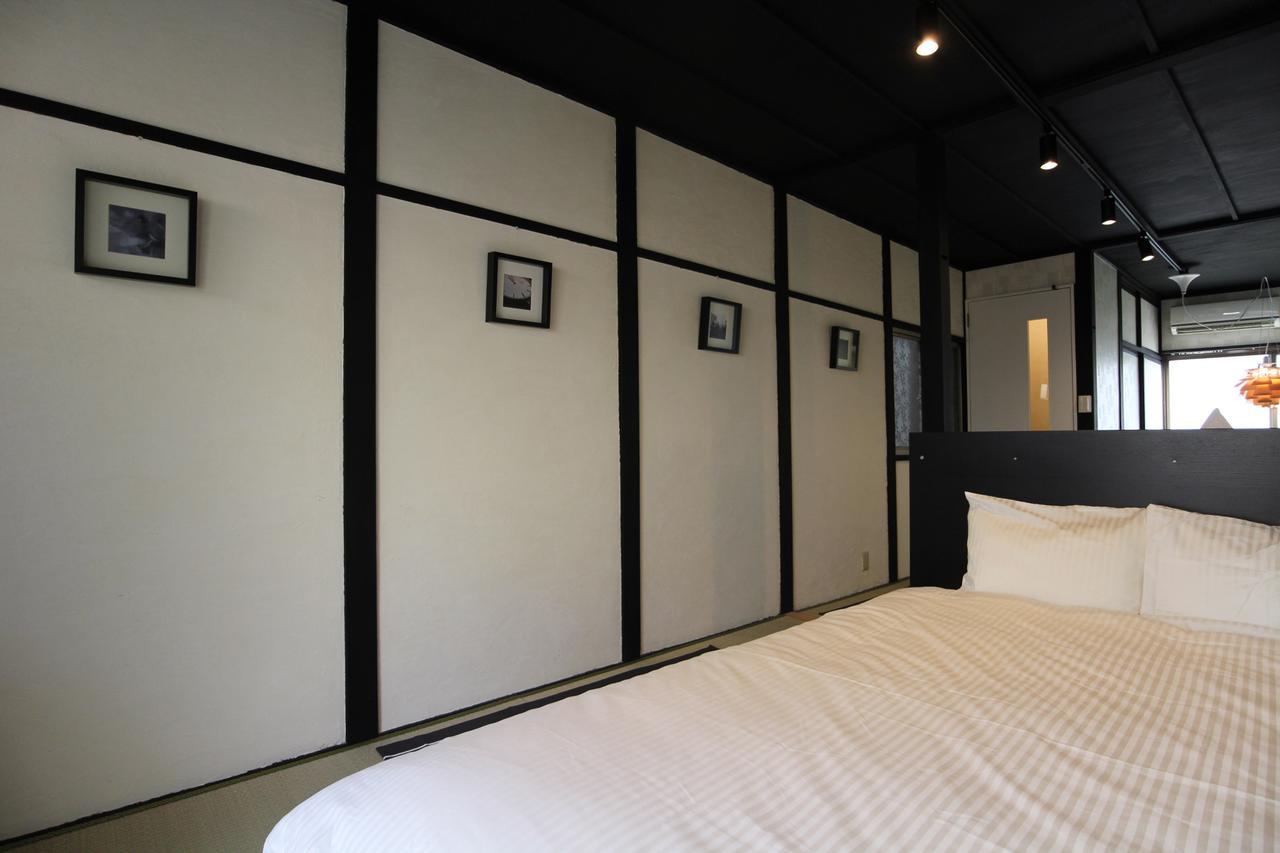Sekai Hotel Tsuki Osaka Bagian luar foto