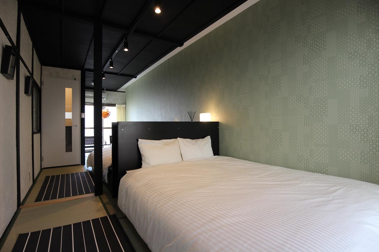 Sekai Hotel Tsuki Osaka Bagian luar foto