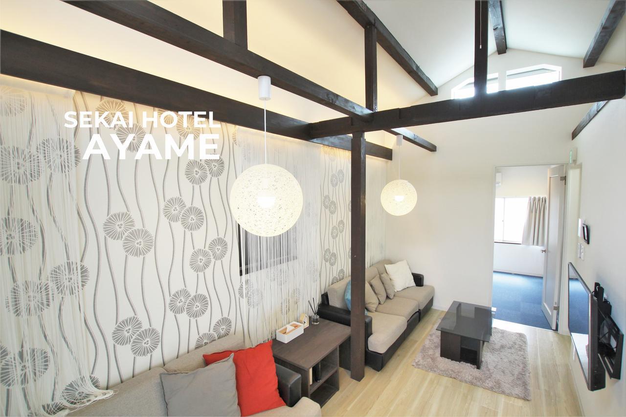 Sekai Hotel Tsuki Osaka Bagian luar foto